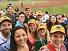 Interns at a baseball game