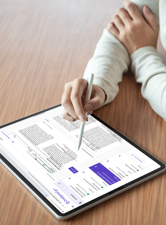 Person signing electronic deal documents on a tablet.