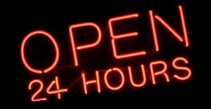 Neon "Open 24 Hours" sign.