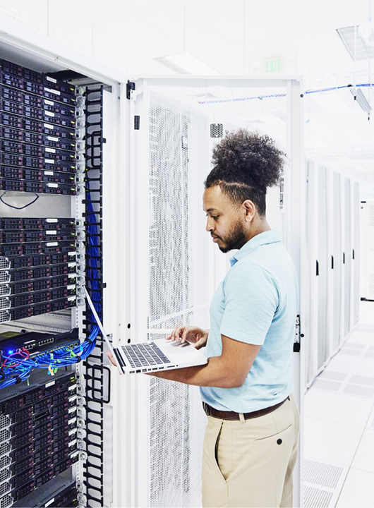 IT Management Data tech working on servers