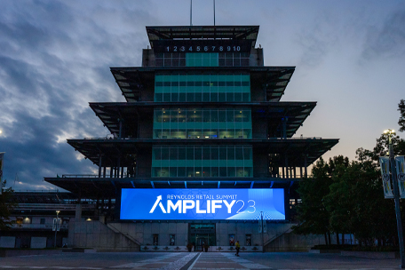 Image of Indianapolis Motor Speedway Pagoda with Amplify 2023 sign.