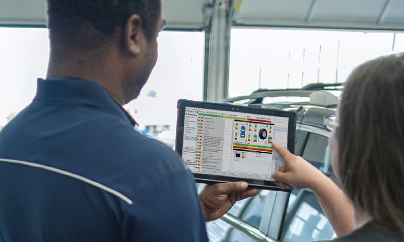 Advance Service dealership software on a tablet